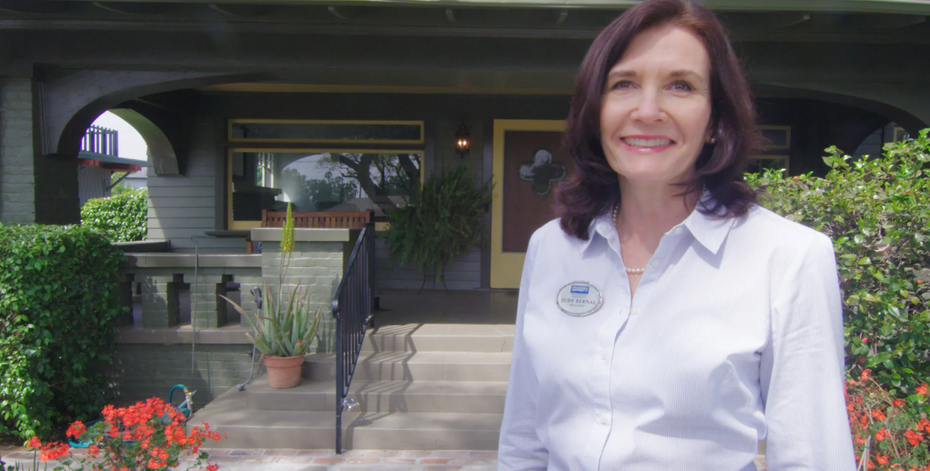 Judy Bernal in front of a Pasadena home