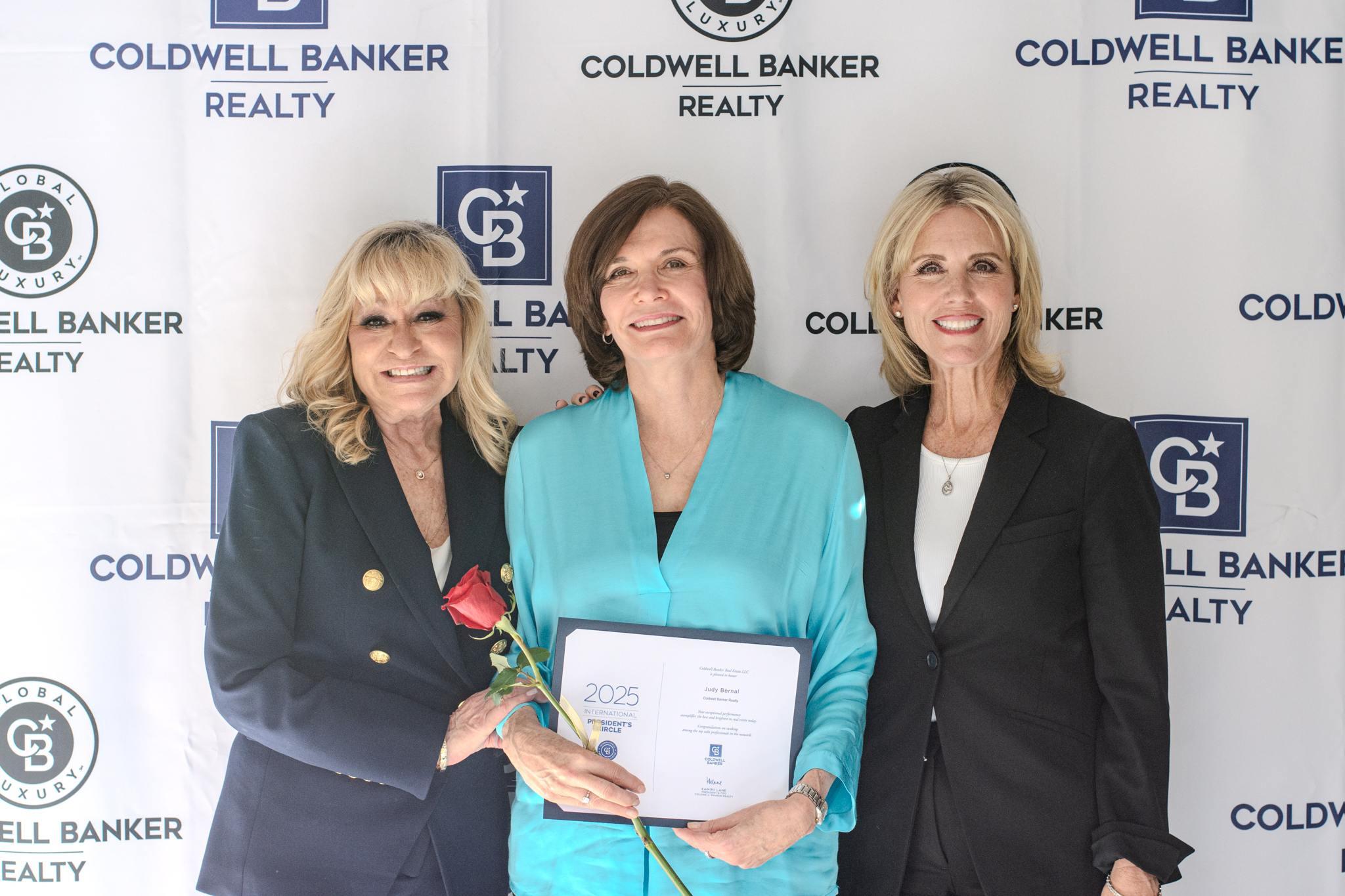 Judy Bernal receiving the 2025 International President's Circle Award